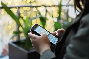 person holding cell phone